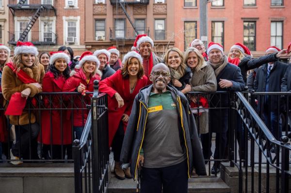 TODAY -- Pictured: (l-r) Jenna Bush Hager, Sheinelle Jones, Hoda Kotb, Craig Melvin, Savannah Guthrie, and other TODAY staff surprise Al Roker, singing christmas so<em></em>ngs and giving well wishes for his recovery on Wednesday, December 14, 2022 -- (Photo by: Nathan Congleton/NBC via Getty Images)