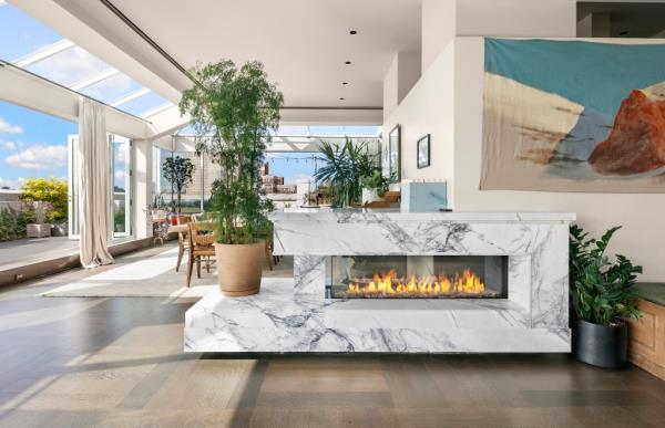 When the temps drop, the penthouse's glass fireplace is a welcome perk. 