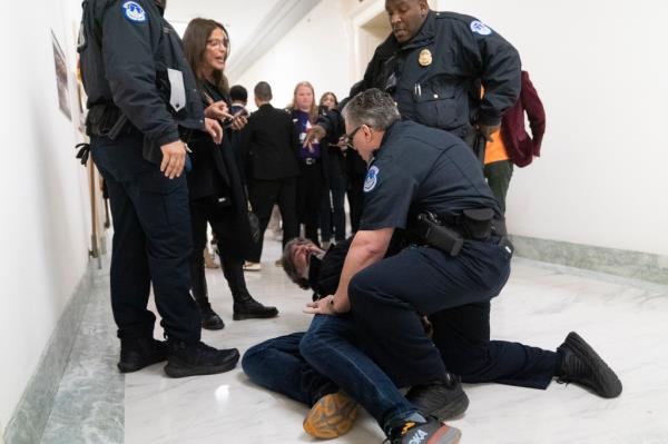 Manuel Oliver is arrested by police. 