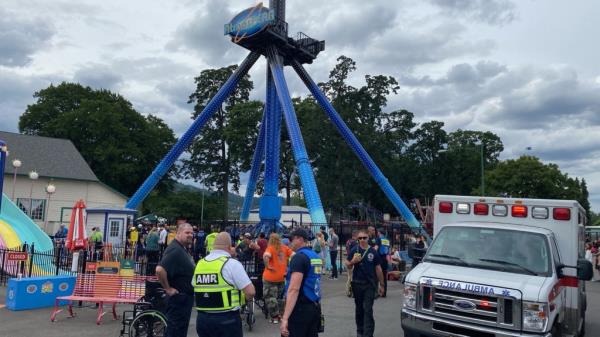 police on scene of broken roller coaster