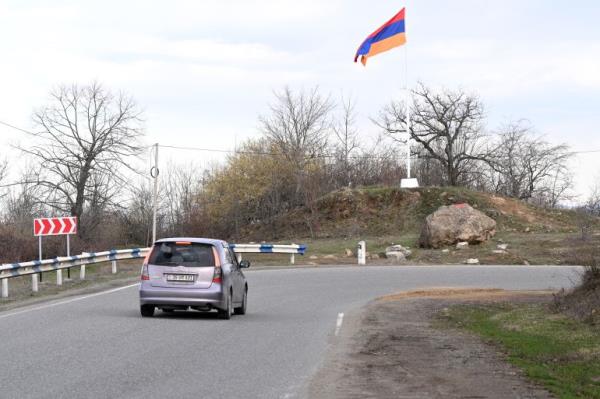 An Armenian flag sits on a roadside outside the village of Voskepar (Azerbaijani name is Ashaghi Askipara) in northeastern Armenia