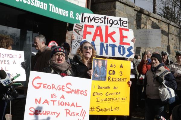 A crowd of demo<em></em>nstrators outside the Queens office of Rep. George Santos.