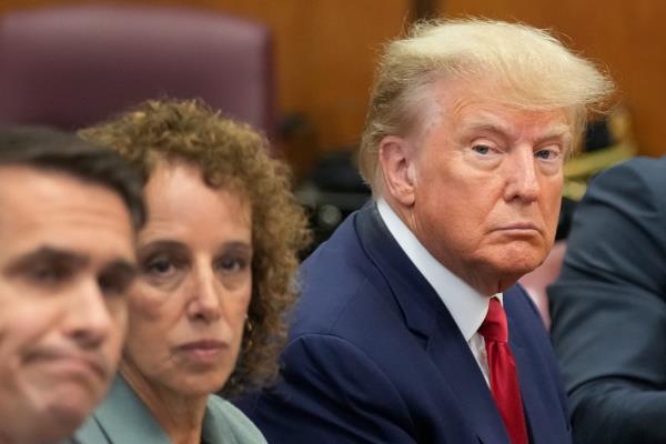 Gloomy looking Trump in court at his arraignment Tuesday.