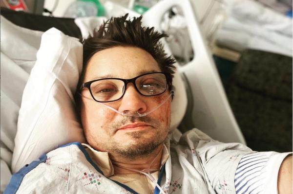 Jeremy Renner in a hospital bed.