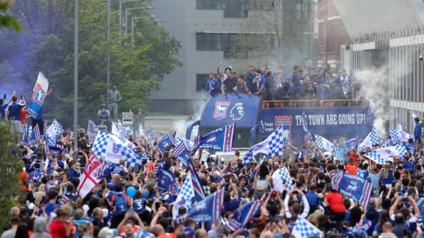 Ipswich Town players during an open-top bus parade in Ipswich to celebrate promotion to the Premier League. Picture date: Mo<em></em>nday May 6, 2024. PA Photo. See PA story SOCCER Ipswich. Photo credit should read: Chris Radburn/PA Wire...RESTRICTIONS: Use subject to restrictions. Editorial use only, no commercial use without prior co<em></em>nsent from rights holder.