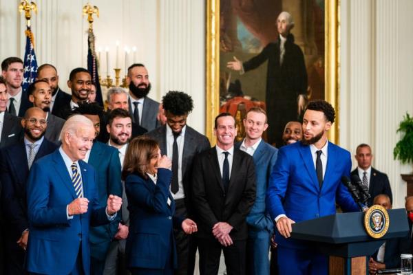 Golden State Warriors basketball player Stephen Curry delivers remarks along side US President Joe Biden, Vice President Kamala Harris and the Golden State Warriors team in the East Room of the White House on Jan. 17, 2023.