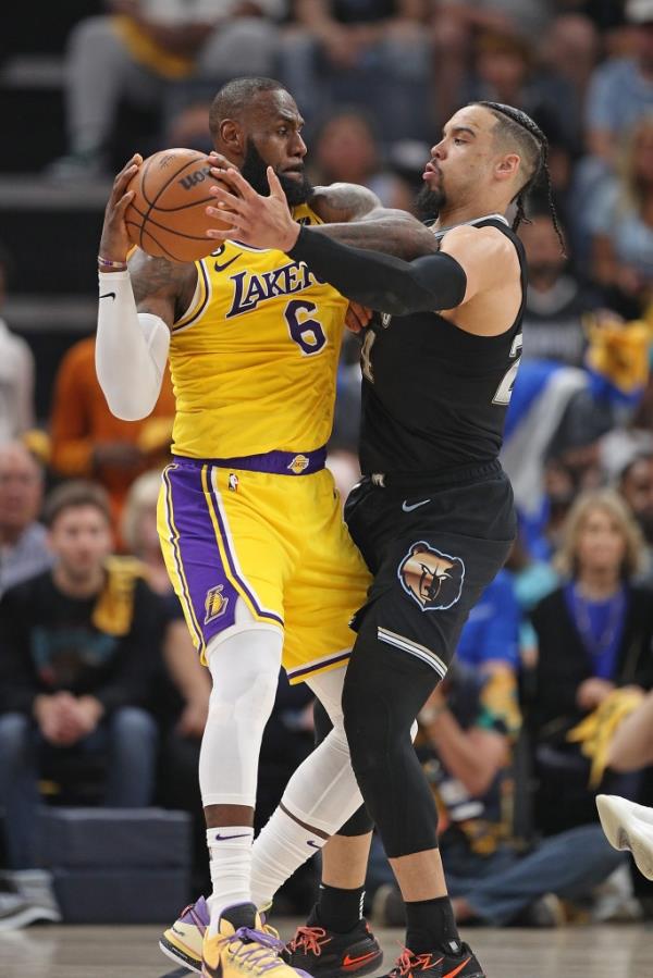 LeBron James handles the ball against Dillon Brooks