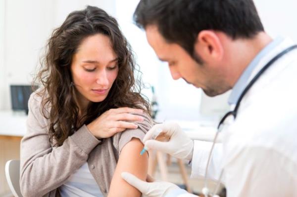 woman being vaccinated