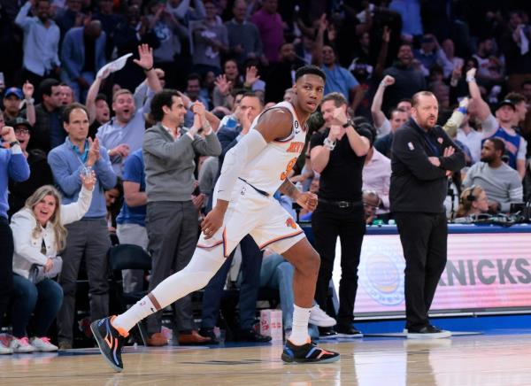 Knicks guard RJ Barrett #9 reacts after he puts up a three point shot