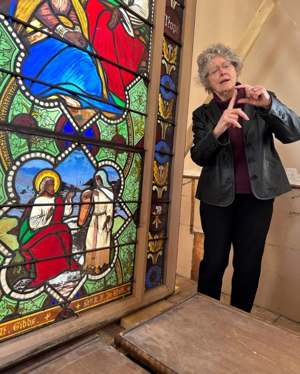 Holy Cross professor and stained-glass expert Virginia Raguin speaks to a group of middle school students.