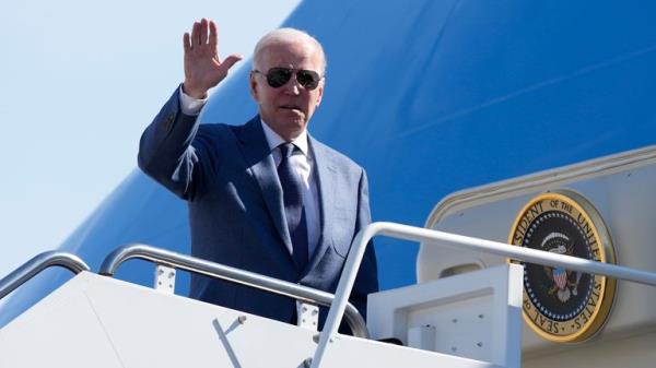 President Joe Biden boards Air Force One, Tuesday, April 11, 2023, at Andrews Air Force ba<em></em>se, Md. Biden is traveling the United Kingdom and Ireland in part to help celebrate the 25th anniversary of the Good Friday Agreement. (AP Photo/Patrick Semansky)