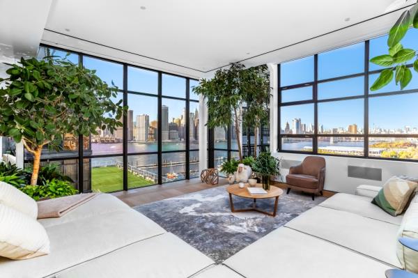 A peek inside the big-dollar rental at 360 Furman St., which has massive windows looking out to wide city views.