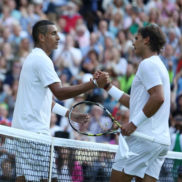 Nick Kyrgios (left) is co<em></em>ngratulated by Rafael Nadal of Spain after the men's singles at Wimbledon on July 1, 2014 in London, England.  