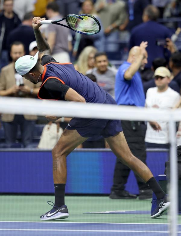 Nick Kyrgios smashes his racket after being defeated by Karen Khachanov in their Men’s Singles Quarterfinal match at the 2022 U.S. Open.