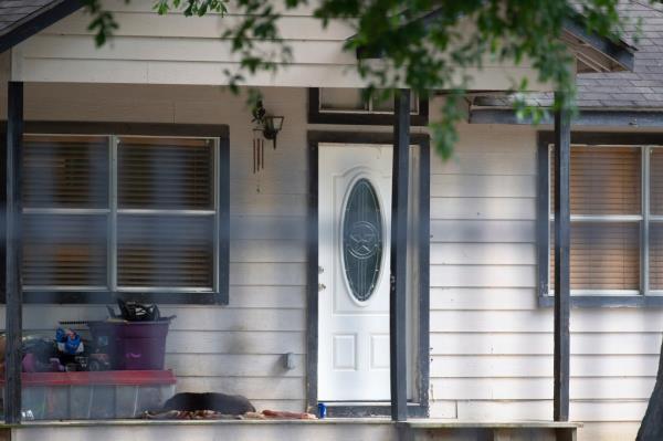 One victim was found by the doorway leading into the living room. 