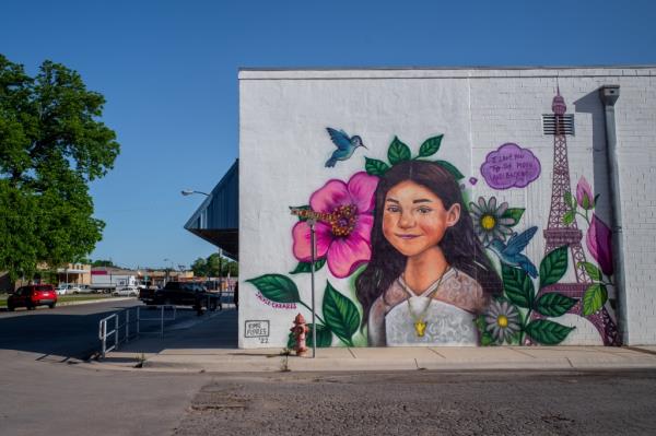 AS - APRIL 27: (L-R) Murals of 10-year-old Jayce Luevanos, 10-year-old Jailah Silguero, and 10-year-old Xavier Lopez.