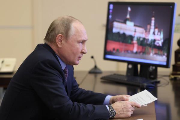 Russian President Vladimir Putin attends a meeting with participants the Pobeda (Victory) Organising Committee via videoco<em></em>nference at the Novo-Ogaryovo state residence, outside Moscow, Russia, Tuesday, Nov. 15, 2022. 