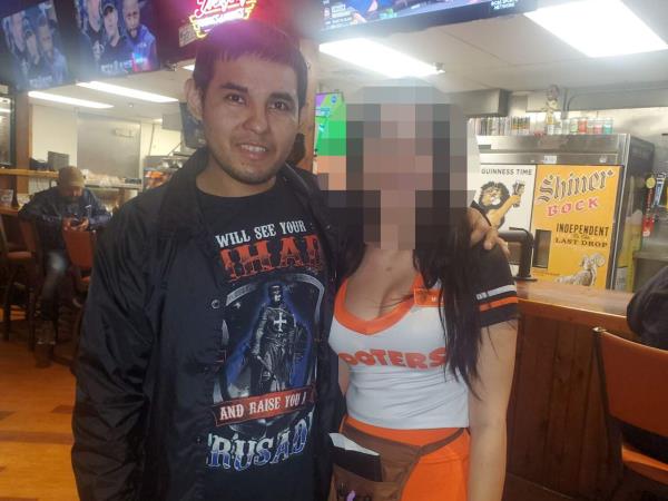 Gunman Mauricio Garcia, pictured at a Hooters restaurant.