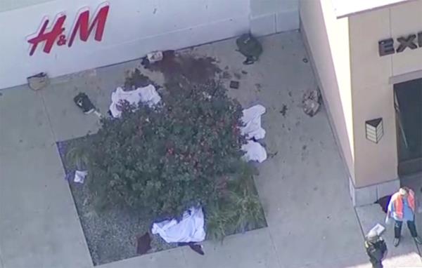 In the aftermath, a news chopper caught the image of at least four bodies outside the H&M store. 