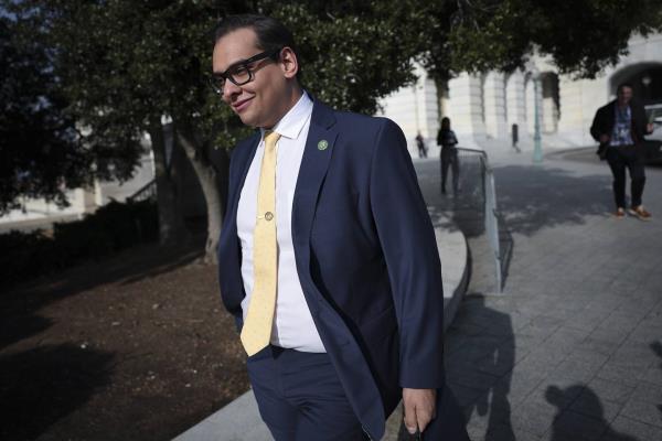 Rep. George Santos leaves the U.S. Capitol on Jan. 12, 2023 in Washington.