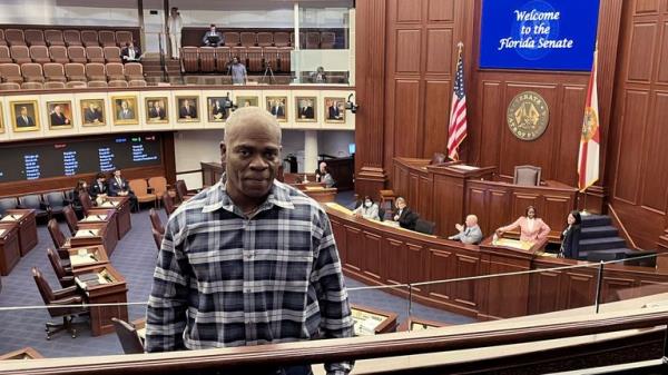 Leo<em></em>nard Allen Cure on the floor of the Florida Senate on the day his compensation bill was passed in April. Pic: AP