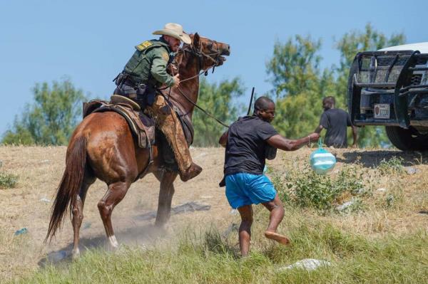 The DHS chief defended the agents, saying that the reins were used to co<em></em>ntrol the horses, not to whip people. 