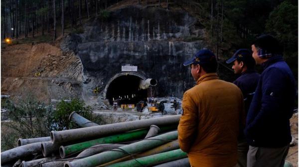 Rescuers outside the tunnel in Uttarakhand