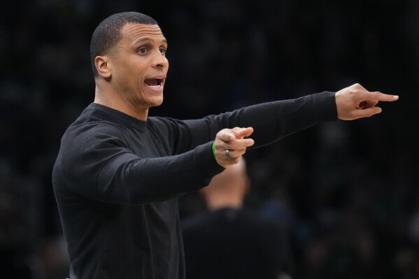 Boston Celtics head coach Joe Mazzulla calls to his players during the first half of an NBA basketball game against the Detroit Pistons, Thursday, Dec. 28, 2023, in Boston. (AP Photo/Charles Krupa)