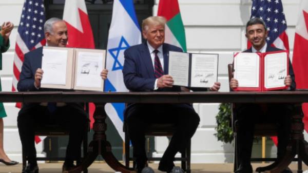 Israel's Prime Minister Benjamin Netanyahu, US President Do<em></em>nald Trump and UAE Foreign Minister Abdullah bin Zayed at signing of the Abraham Accords, at the White House, Sept. 15, 2020. Photo: Reuters