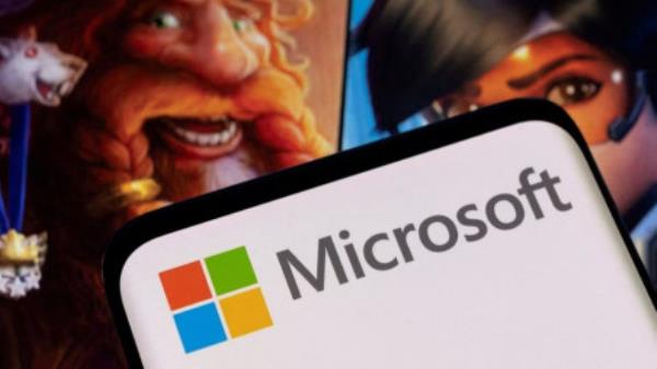 Microsoft logo is seen on a smartphone placed on displayed Activision Blizzard's games characters in this illustration taken January 18, 2022. REUTERS/Dado Ruvic/Illustration//File Photo