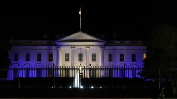 The White House is lit with the colors of the Israeli flag in Washington, U.S., October 9, 2023. REUTERS/Leah Millis