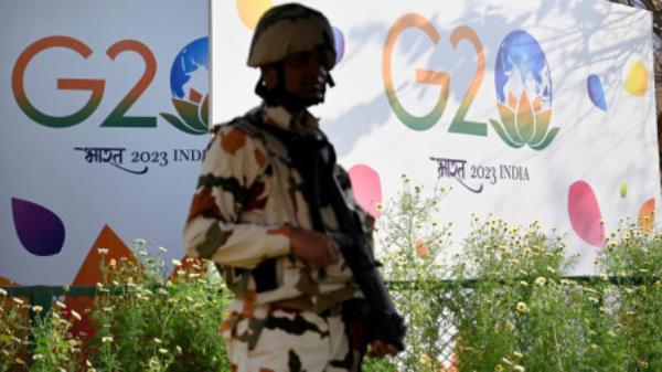 FILE PHOTO: A member of India's military force stands guard at the G20 foreign ministers meeting in New Delhi, India 2 March, 2023. Olivier Douliery/Pool via REUTERS</p>

<p>　　