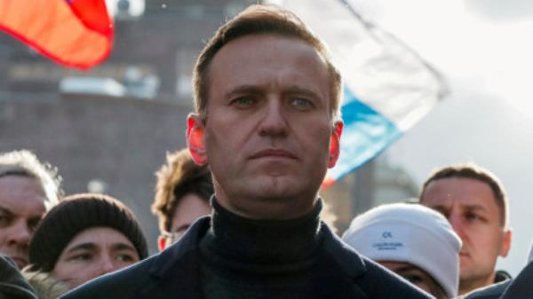 FILE PHOTO: Russian opposition politician Alexei Navalny takes part in a rally to mark the 5th anniversary of opposition politician Boris Nemtsov's murder and to protest against proposed amendments to the country's constitution, in Moscow, Russia 29 February, 2020. REUTERS/Shamil Zhumatov/File Photo