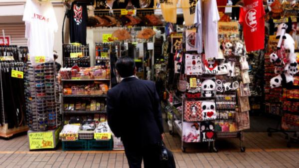 A man looks at a shop at the Ameyoko shopping district in Tokyo, Japan, May 20, 2022. REUTERS/Kim Kyung-Hoon