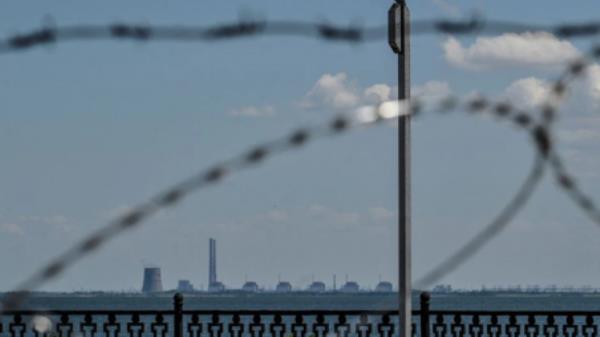 Zaporizhzhia Nuclear Power Plant is seen from an embankment of the Dnipro river in the town of Nikopol, as Russia's attack on Ukraine continues, in Dnipropetrovsk region, Ukraine July 20, 2022. REUTERS/Dmytro Smolienko