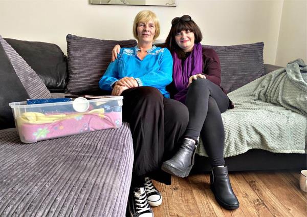 Miriam, left, showing Dee Callis, Head of Debra’s Family Support Team, Katie’s box of Katie’s mementos. Photo: Debra.