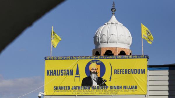 A banner with the image of Sikh leader Hardeep Singh Nijjar is seen at the Guru Nanak Sikh Gurdwara temple, site of his June 2023 killing, in Surrey, British Columbia, Canada September 20, 2023. REUTERS/Chris Helgren/File Photo