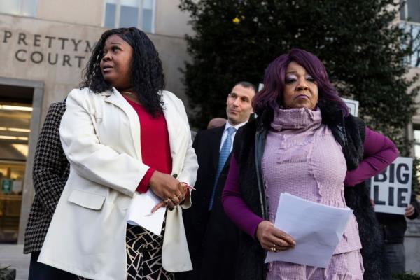 Fulton County election workers Ruby Freeman (R) and Shaye Moss (L) speak to reporters after Rudy Giuliani, former attorney for former President Do<em></em>nald Trump's was ordered to pay them 148 million US dollars in punitive damages in their defamation case in Washington, DC, USA, 15 December 2023.