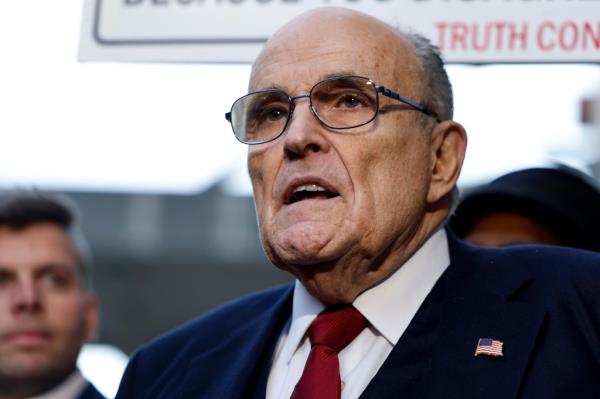 Rudy Giuliani, the former perso<em></em>nal lawyer for former U.S. President Do<em></em>nald Trump, speaks with reporters outside of the E. Barrett Prettyman U.S. District Courthouse after a verdict was reached in his defamation jury trial on December 15, 2023 in Washington, DC.