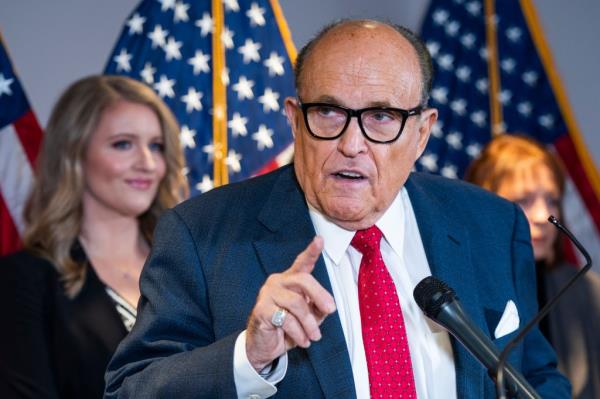 Lawyer to President Do<em></em>nald J. Trump and former mayor of New York City Rudy Giuliani (C) and Trump Campaign Senior Legal Advisor Jenna Ellis (L) speak a<em></em>bout the presidentas legal challenges to his election loss to President-elect Joe Biden in the Republican Natio<em></em>nal Committee Headquarters in Washington, DC, USA, 19 November 2020.