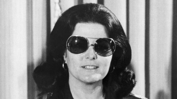 Judith Exner in sunglasses