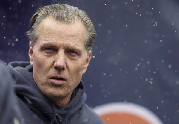 Bears coach Matt Eberflus takes the field in the snow on Dec. 31, 2023, at Soldier Field. 