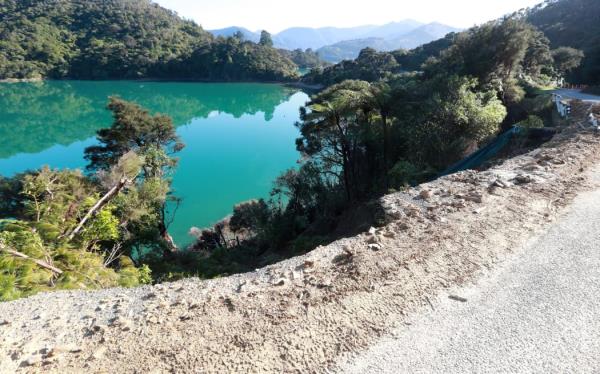 Damage to Kenepuru Road following bad weather in July 2021. The council plans to upgrade marine infrastructure in the area.