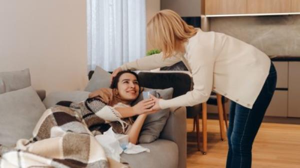 Mom Taking Care of Daughter