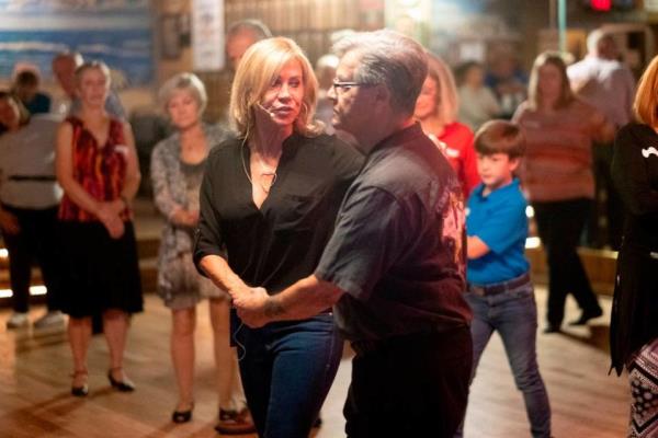 Dance instructor Jackie McGee gives Mo<em></em>nday night dance lessons at Fat Harold’s, one of North Myrtle Beach’s traditio<em></em>nal shag dance clubs. Nov. 6, 2023.