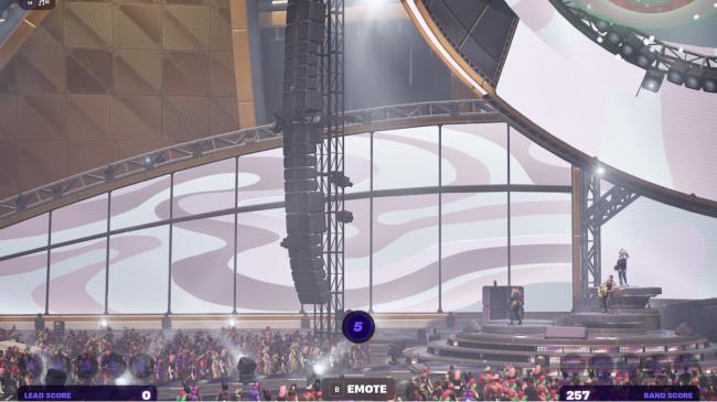 A view of the stage, with multiple performers and tons of fans in Fortnite Festival.