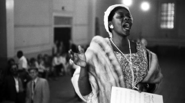 Dinah Washington singing at a church service