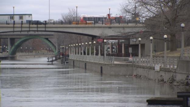 A watery city canal in early winter.