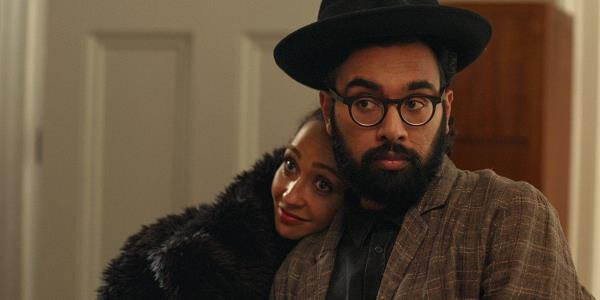 Ruth Negga and Himesh Patel cuddling up together in Good Grief