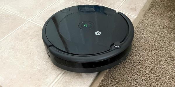 Roomba 694 on hard flooring moving toward  carpet